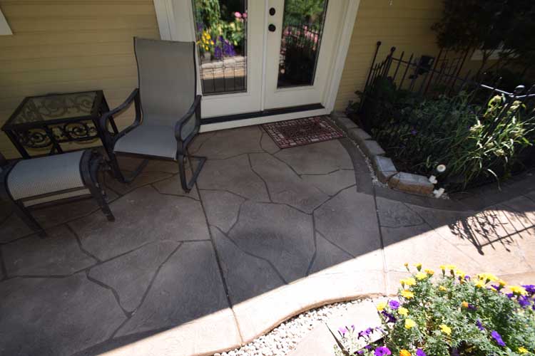 Patio concrete overlay resurface with custom design and color and patio cover